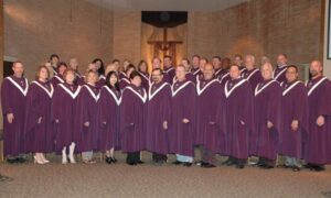 Large church choir in purple robes